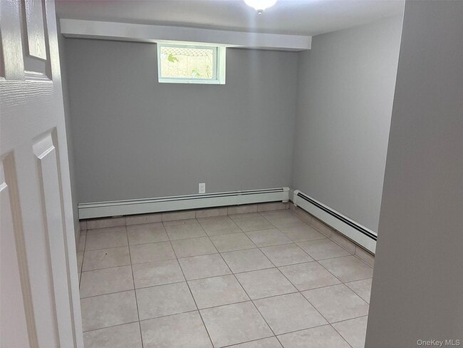 Photo - 56-25 136th St Unit 1FL