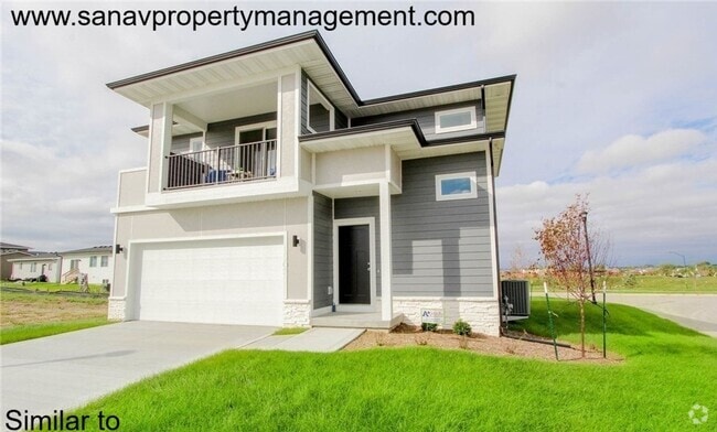 Building Photo - Stunning 4-Bedroom Home with Finished Base...