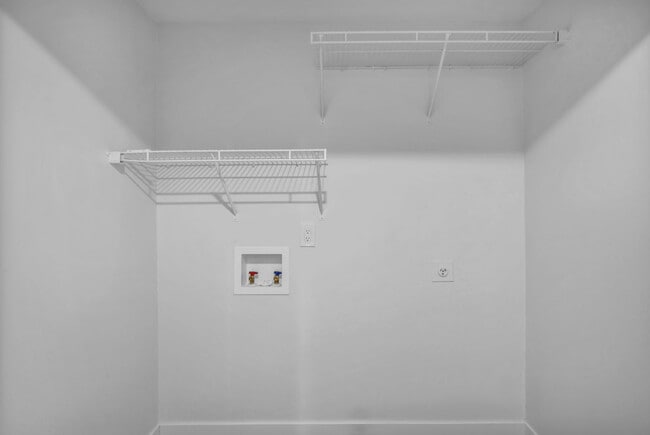 Washer and Dryer Hook Ups with vast storage space