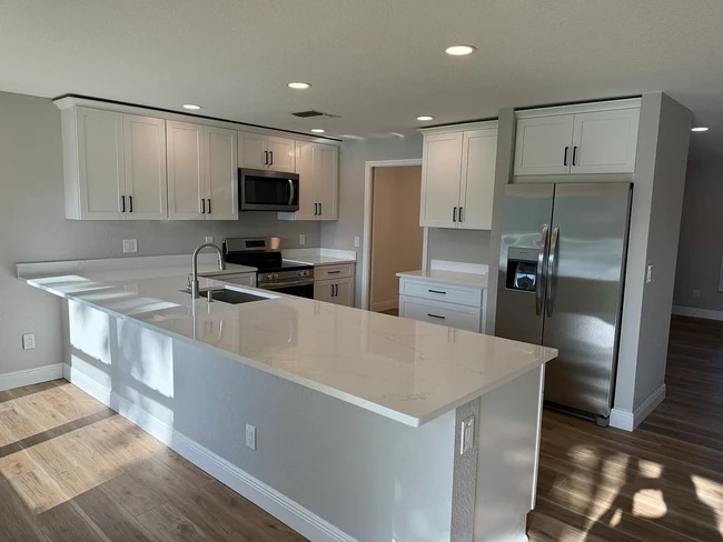 Large bar, Stainless Steel Appliances and huge walk in pantry - 2125 Beecher Rd