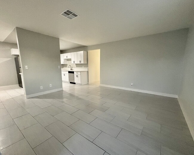Photo - Updated Unit with Vinyl Floors & Stainless...