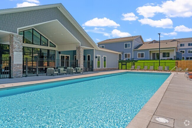 Relax by the pool at The Lodge Luxury Apartments in Rochester MN - The Lodge at Overland Rental