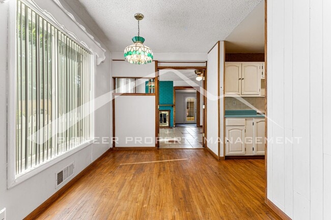 Photo - Single Family Home with 1 Car Garage and Central Air!