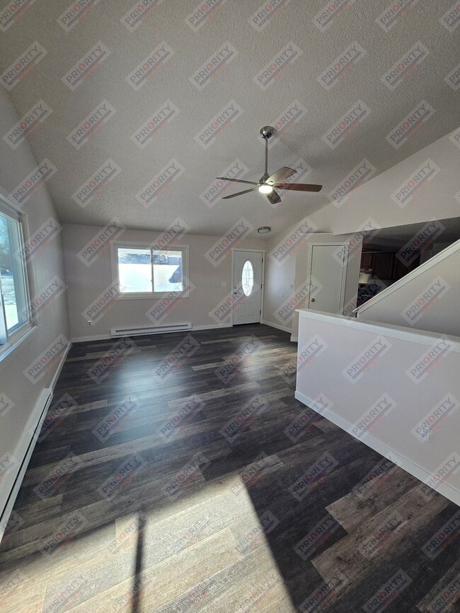 Photo - Single family home with a garage