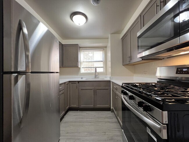 Building Photo - 1300 S 51st Ct Unit 201