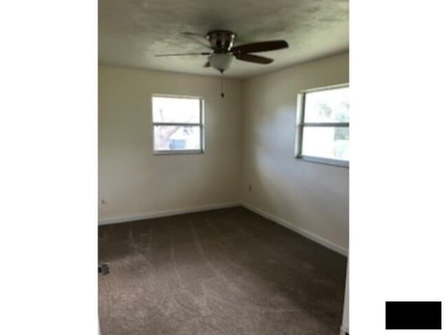 Photo - Large Corner Lot, Fenced in Yard, New Flooring, Fresh Paint, Lawn Care Included!