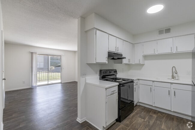 2BR, 1BA - 960SF - Kitchen & Living Room