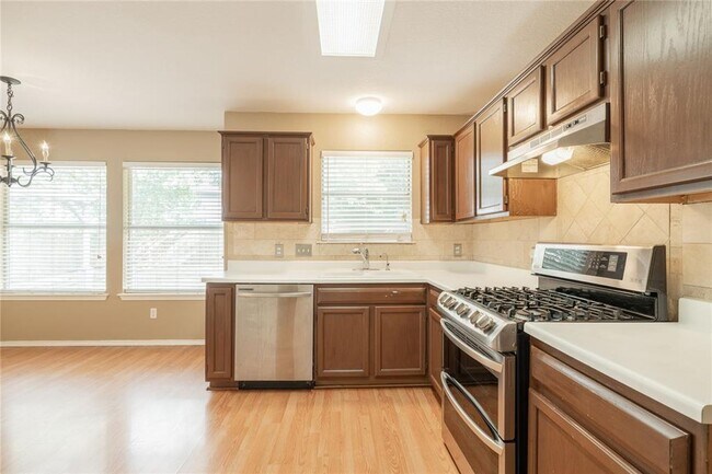 Photo - No Carpet! Tons of Space! Beautiful backya...