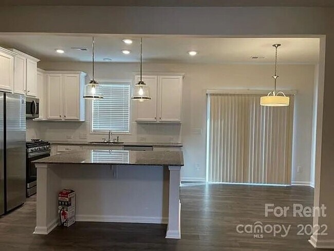 Photo - 3 BR/2BA | 1-Car Garage | End-Unit