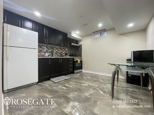 Photo - Modern 1+Den Basement Apartment – Bright &... Unit 2