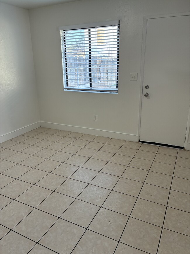 Kitchen to backyard window and door - 218 Woodrow Ave Unit B