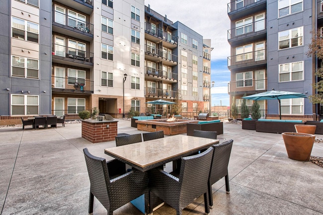 The courtyard features a fire pit