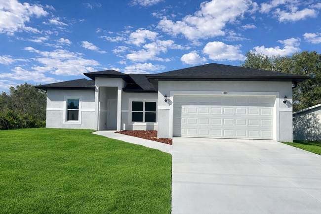 Building Photo - BRAND NEW Modern 4BR/2BA Home with Garage – Peaceful Lake Placid Retreat