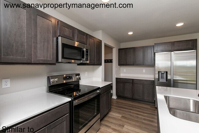 Photo - "Welcome to Your Spacious Sanctuary: Ranch Living at Its Finest!