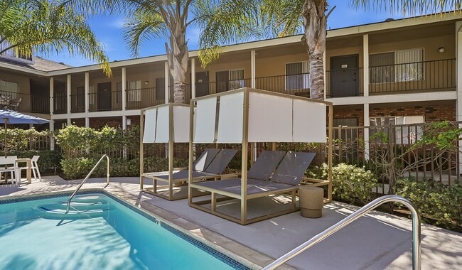 Relax in true resort fashion under the shade of the cabanas.