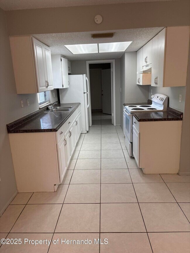 Photo - 9619 Langan St