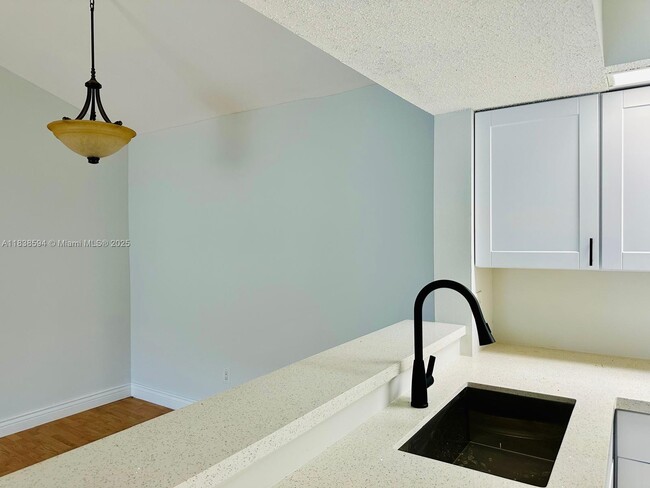 Building Photo - 18880 NW 57th Ave Unit 306 Rental