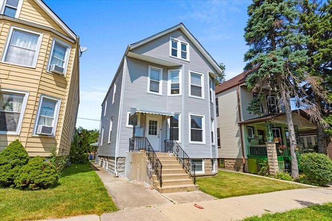 Building Photo - 5344 W Eddy St Unit 1