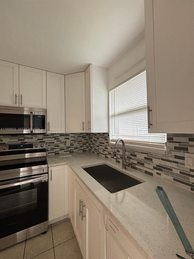 Building Photo - 21904 Lake Forest Cir Unit 203