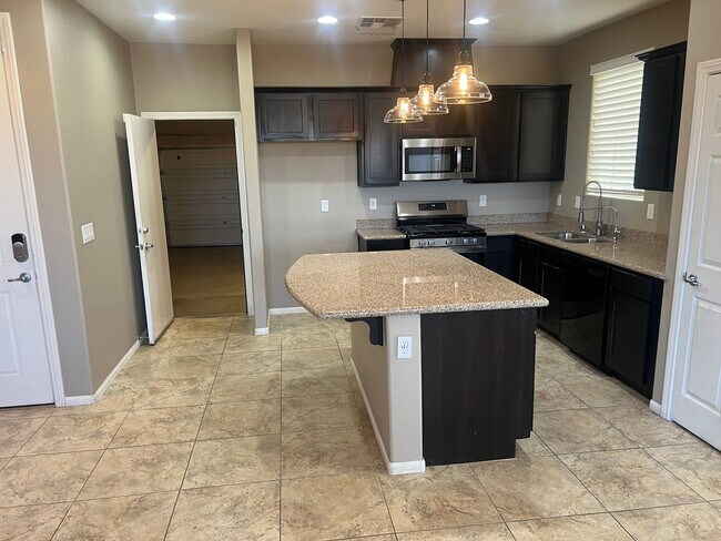 Photo - Located in the Southwest 3 Bed | 2.5 Bath | Loft | 2-Car Garage spacious backyard