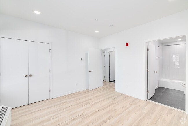 2BR, 2BA - 1,070SF - Primary Bedroom - Norris Park Flats