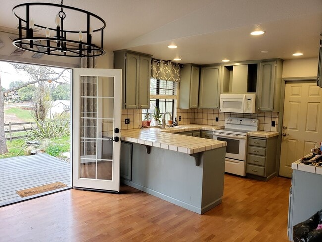 Photo - Charming 3-Bed Home in Gated Community with Updated Interiors & Private Yard!