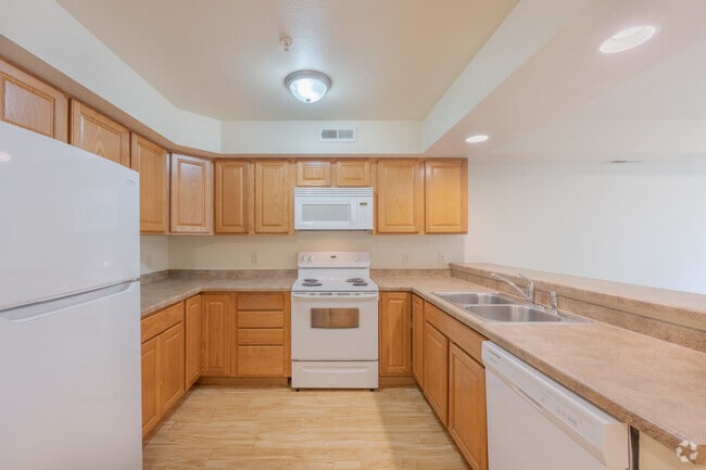 Style A 4BR, 2BA - 1, 425SF - Kitchen - University Falls Apartments