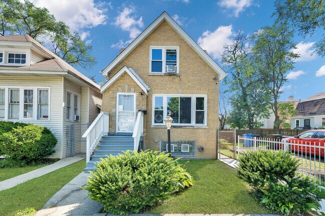 Building Photo - 6645 S Seeley Ave Unit 2
