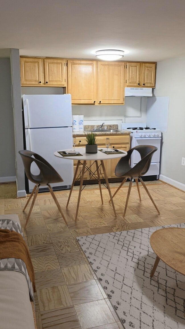 Studio kitchen area (virtually staged)