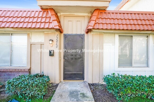 Building Photo - Beautifully Updated 2-Bedroom Condo with New Kitchen & Community Pool