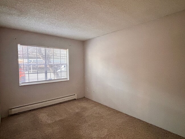 Photo - Spacious 2-Bedroom Condo in Denver's Monaco Lakes Community | $1,295/mo