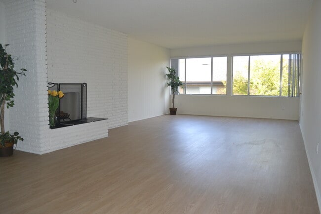 Spacious Living Room with Fireplace