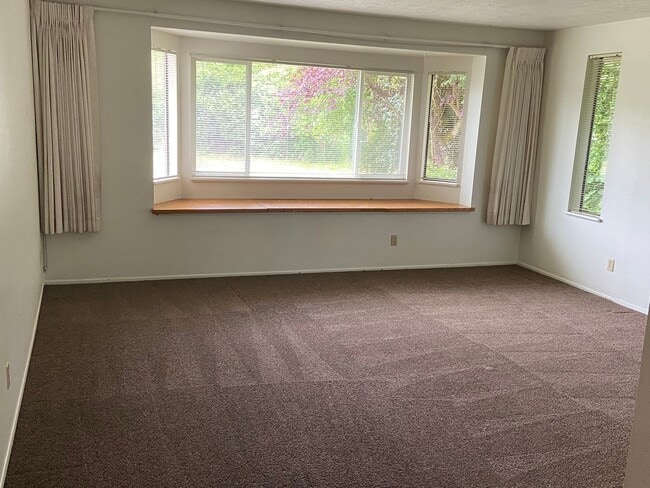 Photo - New Paint & Flooring.  Large yard and over...