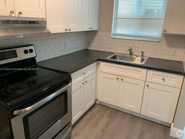 Building Photo - 793 NW 91st St Unit 4 Rental