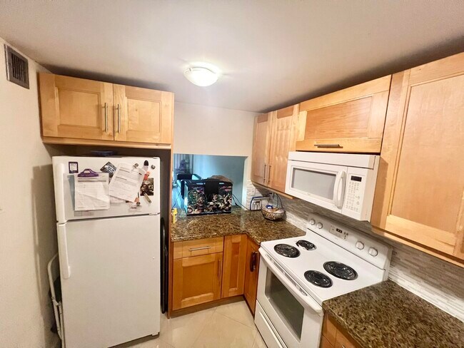 Building Photo - 9430 Tangerine Pl Unit 202