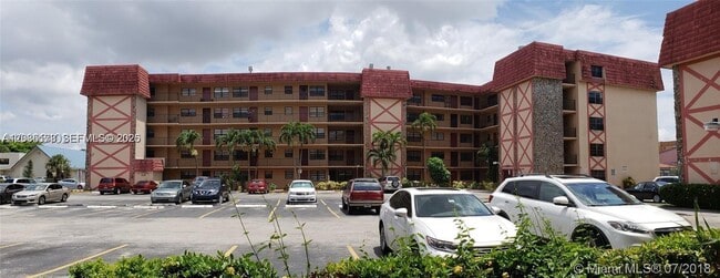 Building Photo - 1325 W 68th St Unit 214