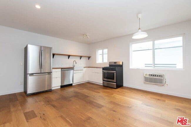 Building Photo - 3933 Marathon St Unit 205B