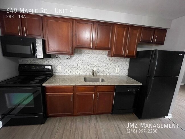 Building Photo - 649 W Maple Rd Unit 4