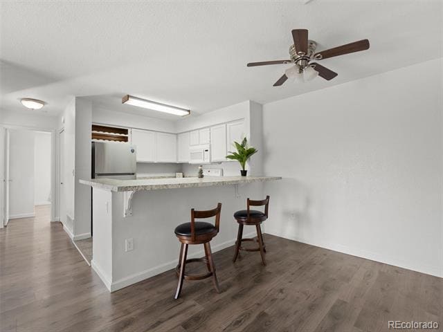 Building Photo - 4460 S Pitkin St Unit 120