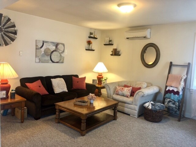 Living Room with Bay Windows - 17 E Main St Unit Front