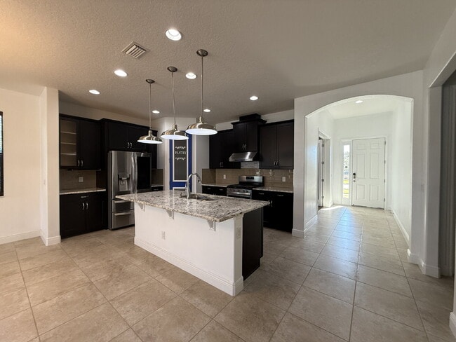 Photo - 4BR, 2.5BA home with resort style outdoor living!