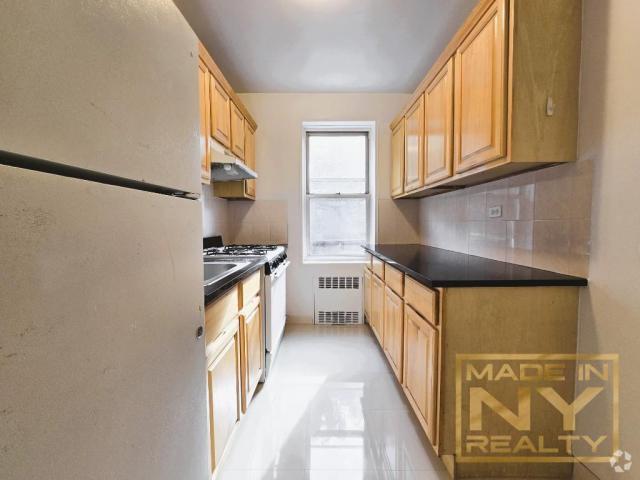 Building Photo - 2 bedroom in REGO PARK NY 11374 Unit 215 Rental