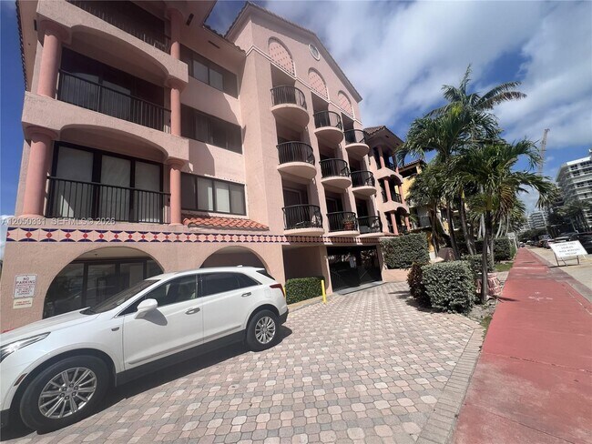 Building Photo - 8816 Collins Ave Unit 105