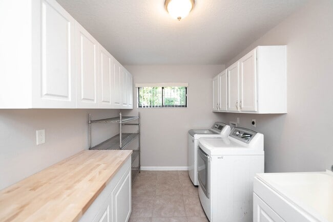 Photo - Welcome to this spacious three-bedroom, three-bath home in the heart of Palm Bay