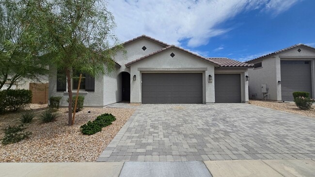 Building Photo - Three car garage! Closer to Surprise than Wittman!