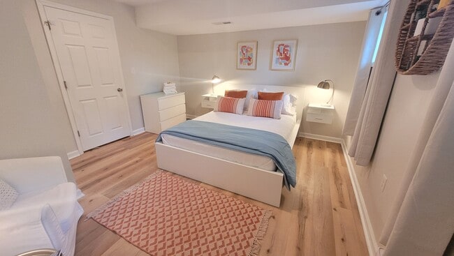 Newer bedroom and bedding - 122 Phillips Cir Unit The Flat at Phillips