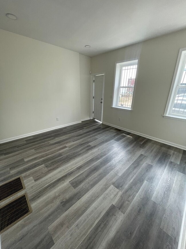 Photo - 3-Bedroom Home with Modern Finishes & Spacious Backyard