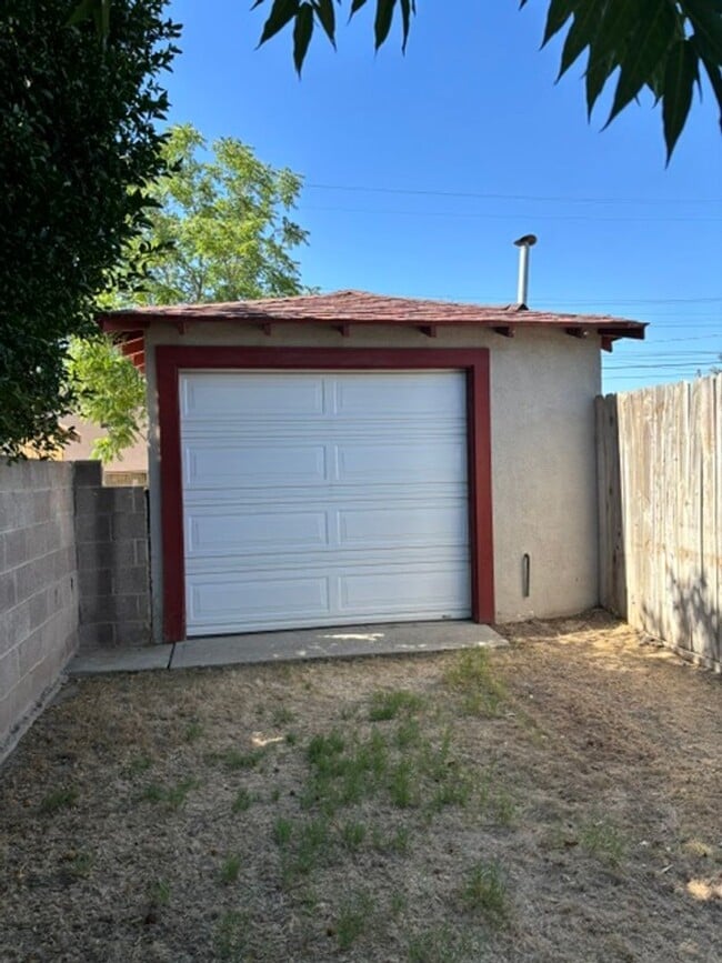 Photo - Charming 2 Bedroom, 1 Bathroom Home with Garage & Large Backyard – Available Now!