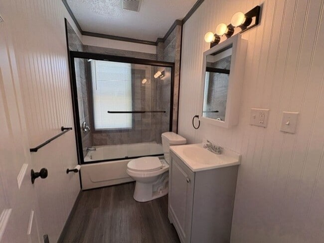Photo - Move-In Ready 2-Bedroom Home with Modern Kitchen, Basement & Front Porch