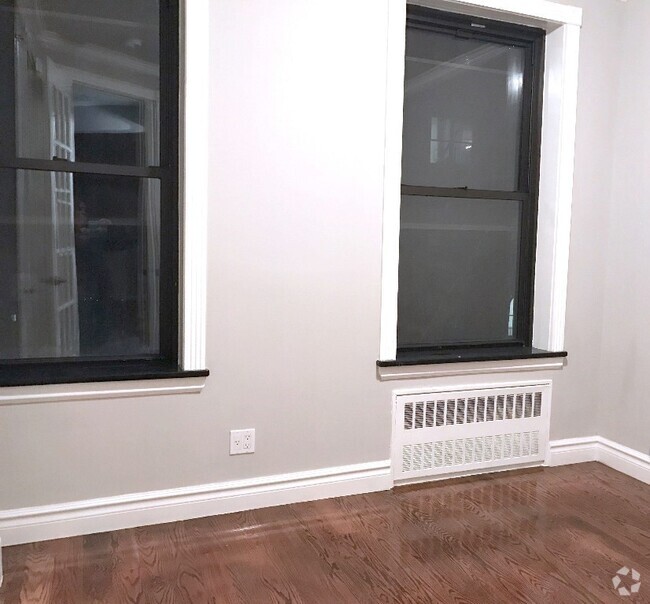 Building Photo - 209 E 25th St Unit 1A Rental